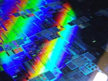 The reflective surface of a 12-inch silicon wafer, the semiconductor substrate from which computer chips are fabricated.