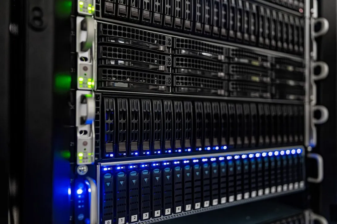 Server racks in a data center computer room that hosts web servers.