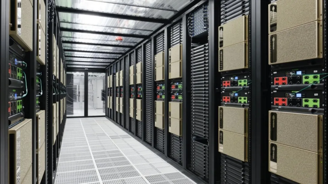 Rows of Nvidia DGX AI server systems installed in a data center aisle.